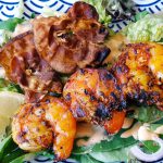 Gamba's met bacon op de primogrill in een handomdraai op tafel...